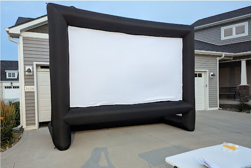Outdoor movie night with an inflatable screen in Connecticut.